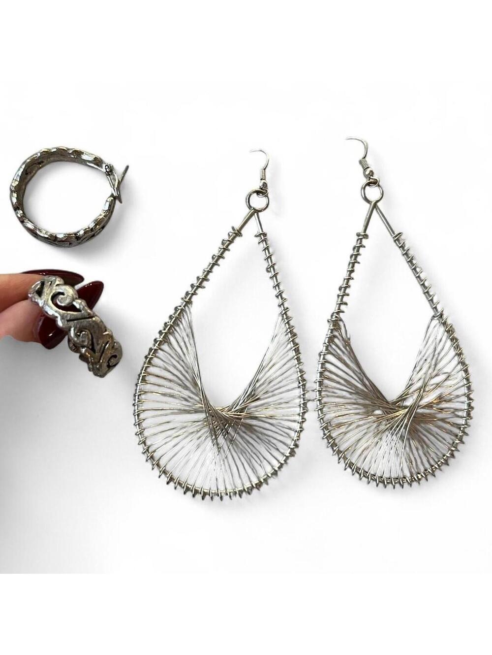 A Set of 2 Silver-Toned Vintage Boho Themed earrings.
